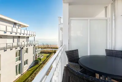 Image de Lichtdurchflutetes Apartment an der Ostsee mit Balkon und Saunabereich im Haus