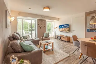 Image de Liebevoll & Hochwertig Eingerichtetes Apartment mit Tollem Balkon zur Meerseite