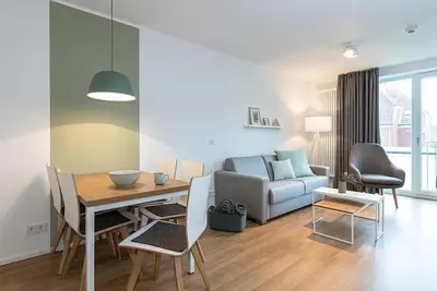 Image de Tolles Ferienapartment in Strandnähe mit Sonniger Loggia & Saunabereich im Haus!