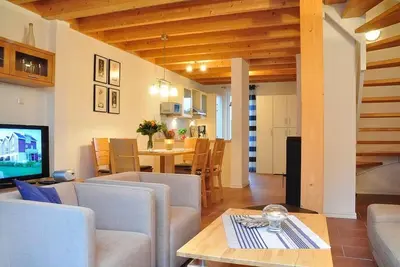 Image de Great vacation home on the dyke with terrace, balcony with sea view, sauna & wood-burning stove