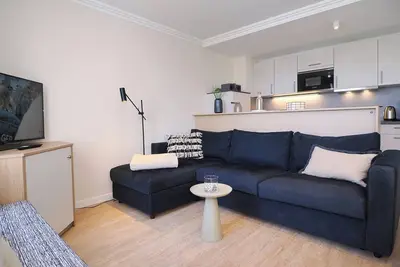 Image de 3-zimmer Ferienwohnung in Bester Strandlage mit Zwei Balkonen und Blick zum See