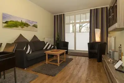 Image de Schöne Ferienwohnung mit Überdachter Ost-terrasse in Erstklassiger Strandlage