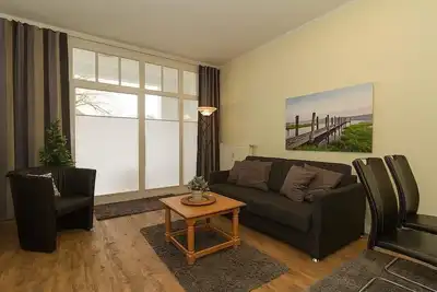 Image de Schöne Ferienwohnung mit Überdachter Terrasse in Erstklassiger Lage am Strand