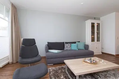 Image de Hübsche Ferienwohnung mit Balkon und Blick bis zum Meer in Direkter Strandlage