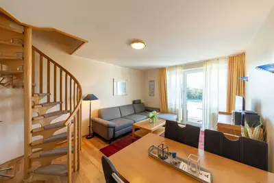 Image de Familienfreundliche Maisonettewohnung an der See mit Balkon und Blick zum Deich
