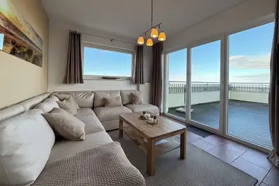 Image de Tolles Penthouse mit 54 qm Großer Dachterrasse, Meerblick, Sauna und Hot-tub!