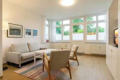 Image de 3-room vacation apartment directly on the Baltic Sea - use of sauna in the house included!