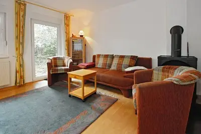 Image de Familienfreundliches Ferienhaus mit Süd-terrasse und Kaminofen in Strandnähe