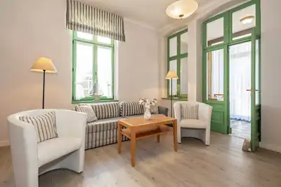 Image de 4-zimmer Ferienwohnung mit Wintergarten und Terrasse in Toplage an der Promenade