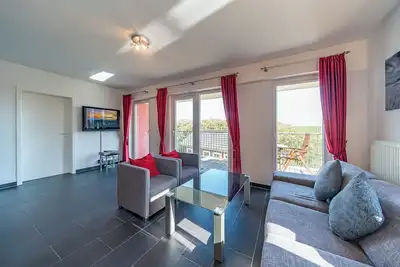 Image de Apartment mit Sauna, Whirlbadewanne und Balkon an der Graft mit Blick zum Deich!