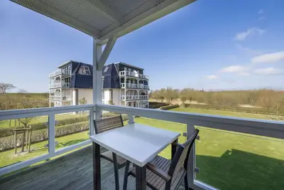 Image de Strandnahe, Hundefreundliche Ferienwohnung mit Sauna und Balkon mit Strandkorb