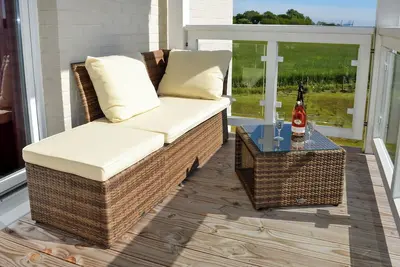 Image de Strandnahe Ferienwohnung mit Sauna und Tollem, Ăśberdachtem Balkon mit Deichblick