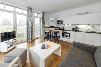 Image de Familien- und Hundefreundliche Ferienwohnung mit Loggia - nur 100 m zum Strand!