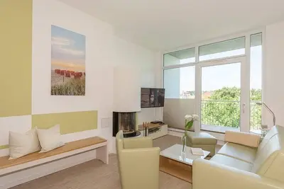 Image de Tolles Ferienapartment mit Dachterrasse, Strandkorb, Kamin, Sauna und Meerblick