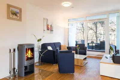 Image de Modernes, Strandnahes Apartment mit Großem Balkon, Fußbodenheizung u. Kaminofen