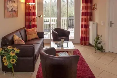 Image de Ostsee-ferienwohnung mit Südbalkon und Waldblick, Saunabereich & Pool im Haus!
