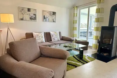 Image de Familienfreundliches Apartment mit Infrarotsauna, Kamin & Balkon in Strandnähe