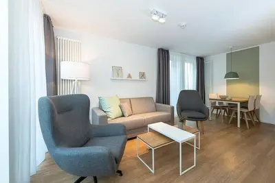 Image de Tolles Apartment in Toplage mit Sonniger Süd-terrasse und Saunabereich im Haus
