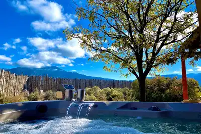 Image de Colorful dog-friendly home with sweeping views, a private hot tub, & large yard