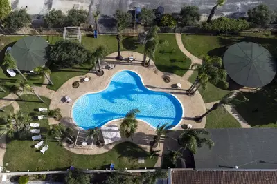 Image de Appartement 'Oasi Lamia - 5' avec piscine partagée, Wi-Fi et climatisation.