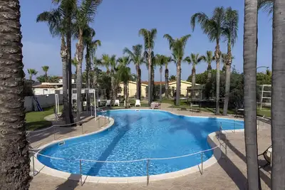 Image de Appartement 'Oasi Lamia - 2' avec piscine partagée, Wi-Fi et climatisation.