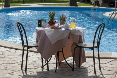 Image de Appartement 'Oasi Lamia - 1' avec piscine partagée, Wi-Fi et climatisation.