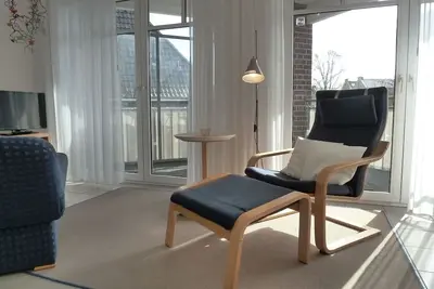 Cozy vacation apartment on the upper floor with corner balcony in a central location