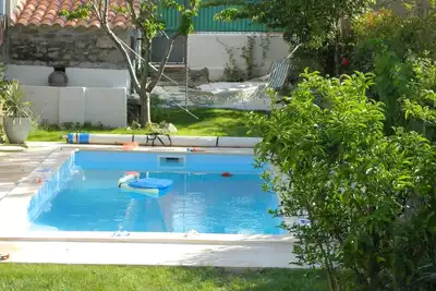 Image de Pretty village house with private pool in rear garden. Opposite historic church.