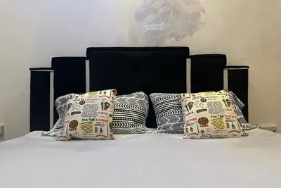 Image de Harmony house with a king size bed and two double beds