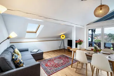 Image de Appartement \"Am See\" avec vue sur les montagnes, jardin partagé et Wi-Fi.