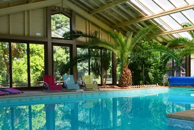 Image de Gîte for 15 people with indoor swimming pool and Jacuzzi