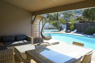 Image de Maison en bois avec piscine située Route de Palombaggia à 500 mètres de la mer