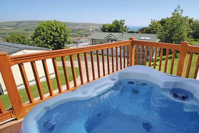 Image de 3 chambres à coucher à Swanage