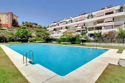 Image de Appartement tranquille entre golf et mer avec piscine