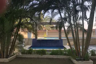 Image de Private resort type condo setting with full access to garden and pool