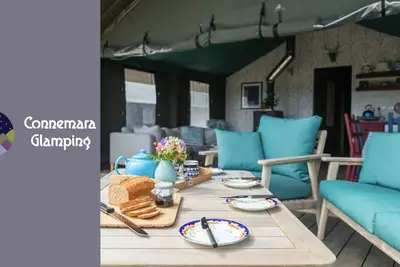 Wild Atlantic Way Connemara luxury safari-tent glamping with outdoor hot bath.