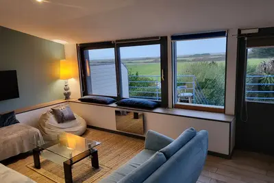Image de Gîte lumineux avec large vue sur l'océan à 1 min de la plage