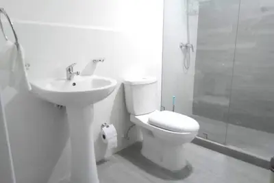 Image de Elegant Apartment with Pool- close to Olé Supermarket Olé-15 min from the beach!