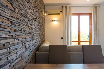 Image de Modern three-room apartment equipped with all comforts a few kilometers from the most famous beaches