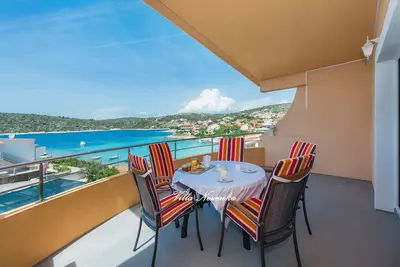 Image de Appartement de deux chambres avec la terrasse et la vue sur le mer Kanica, Rogoznica (A-20298-a)