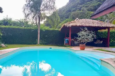 Image de Propriété à Tahiti avec climatisation, cuisine, piscine et Wifi!