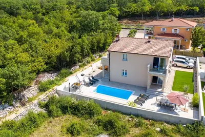 Image de Appartement de vacances quartier calme avec piscine commune