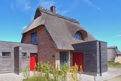 Image de Niedermoor, das Reetdach Doppelhaus fĂĽr 4-5 Personen mit Romantischem Birkblick