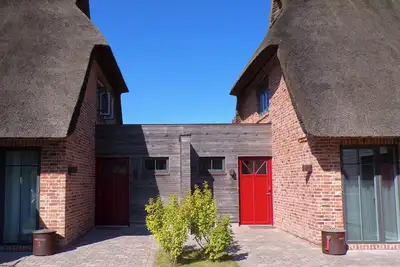 Image de Malerhaus Wollgras, das Reetdoppelhaus für 4-5 Personen mit Schönem Birkblick