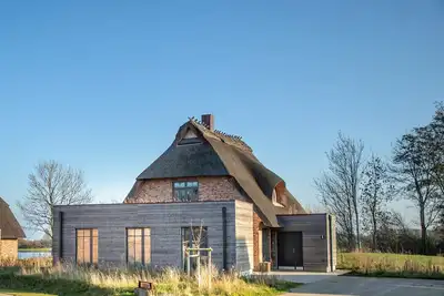 Image de Erlenstamm, das Atelierhaus Unter Reet fĂĽr bis zu 8 Personen, Direkter Seeblick