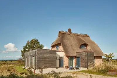 Image de Regenbogen, das Atelierhaus Unter Reet fĂĽr bis zu 8 Personen, Direkter Seeblick