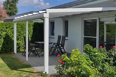 Image de Ferienhaus für 4 Pers. mit 2 Schlafzimmern, Überdachter Terrasse, Holzofensauna