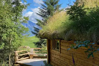 Image de Wooden cabin with grass roof, sleeps 2-5 people. , Self catering. Open fire place