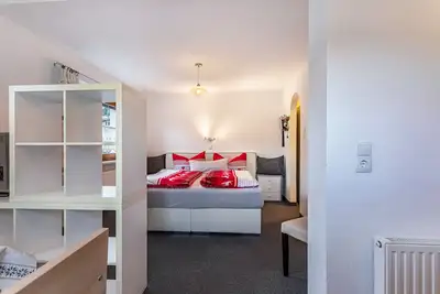 Image de Appartement 'Bergwelt C' avec vue sur les montagnes et Wi-Fi.