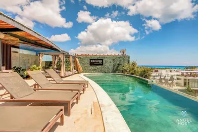 Image de Trendy Condo, Infinity Pool, Walk to Coco Beach